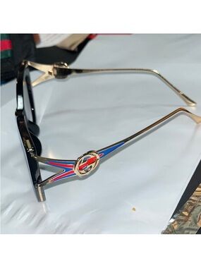 Gucci Gold Frame Sunglasses with Black, Blue and Red Accents